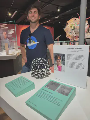 Postdoc Francesco Bellina visiting the exhibition.