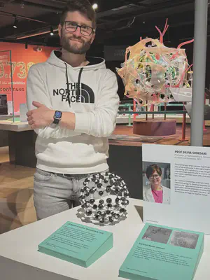 Postdoc Riccardo Ossanna visiting the exhibition.