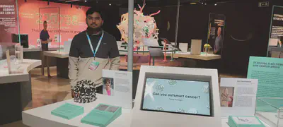 PhD student Manikrishna Lakavathu volunteering at the exhibition.