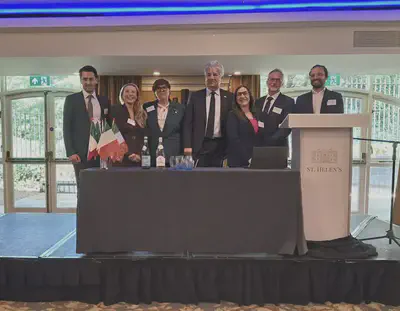 Group photo of the ambassador Nicola Faganello together with IIC director Michela Magrì and all the invited speakers.